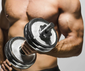 man working out with dumbbells