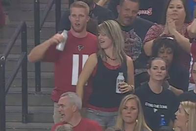 female falcons fan gives boyfriend celebratory crotch grab