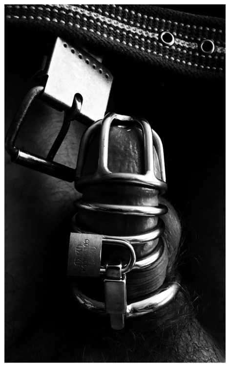 Ruby Ryder shares black and white photo of a captive cock in locked chastity cage