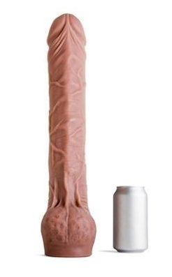 Ruby Ryder shares very large realistic shaped and colored dildo beside soda can for size comparison